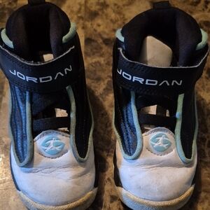 Jordan Black and White High-Top Sneakers